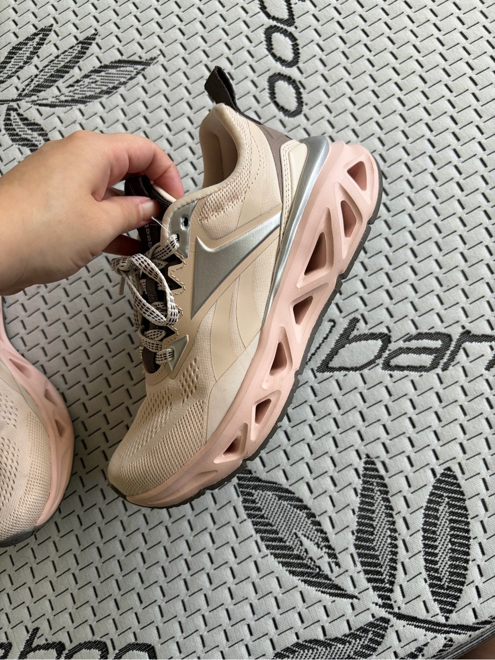 Reebok Women's Beige Pink Athletic Sneakers with Silver Accent